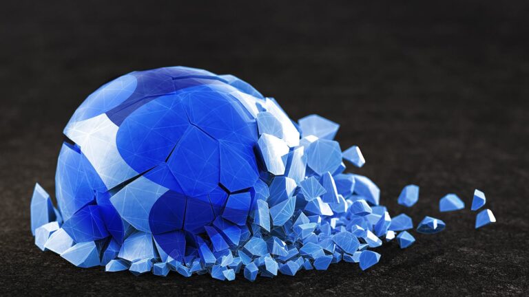 A 3D digital artwork depicting a blue geometric sphere shattering into many polygonal fragments on a dark surface. The fragments scatter to the right, displaying varying shades of blue and white, resembling a broken glass effect.